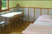 Kemp Úštěk u jezera Chmelař 5L chaty KEMP III vařič, konvice, nádobí, chladnička WC a sprcha
